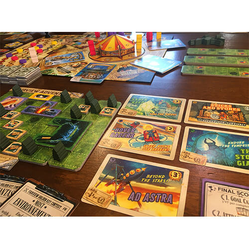 tenpenny parks game spread and components on wooden table